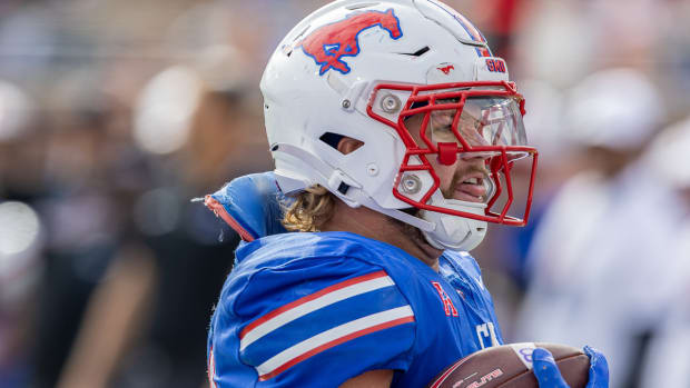 Ponies running backer Tyler Lavine gets to end zone for a third time against Navy